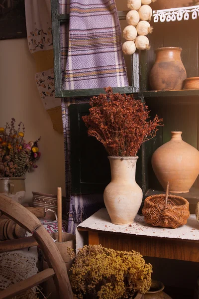Old cupboard with pots and jars — Stock Photo, Image
