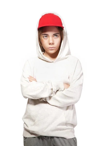 Teenager in a red cap and sportswear — Stock Photo, Image