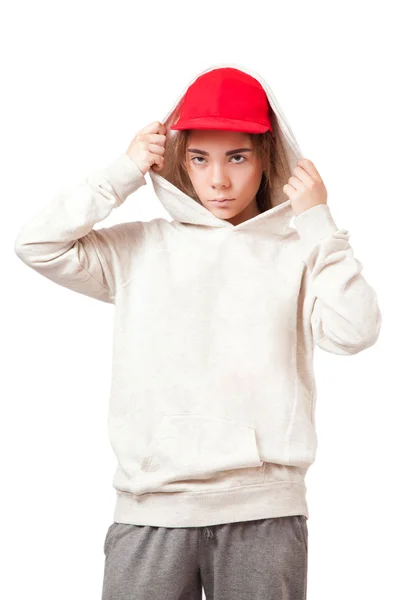 Adolescente en una gorra roja y ropa deportiva —  Fotos de Stock