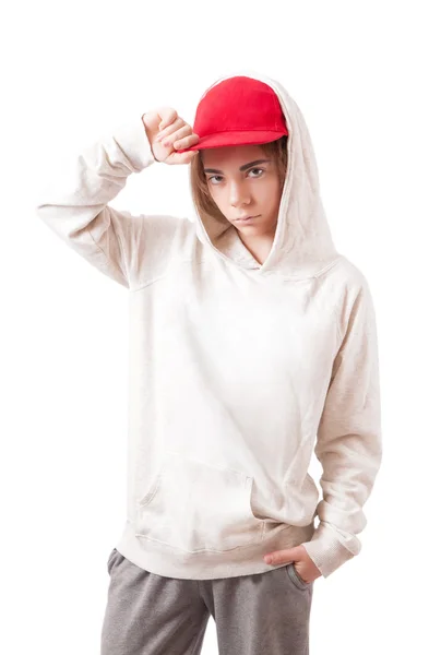 Adolescente en una gorra roja y ropa deportiva —  Fotos de Stock