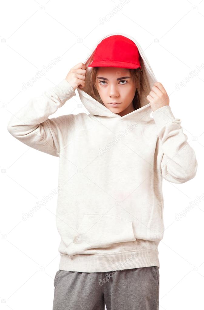 Teenager in a red cap and sportswear