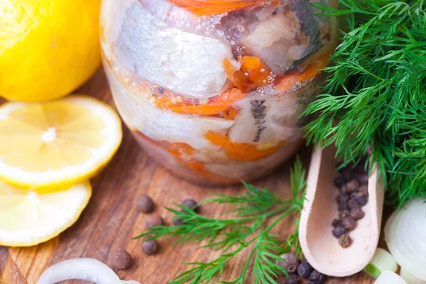 Marinated herring in a jar — Stock Photo, Image