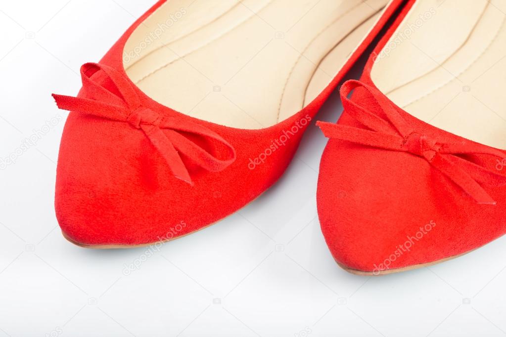 Pair of red female shoes, closeup
