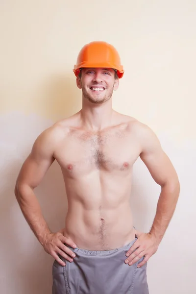 Attractive young man in a helmet — Stock Photo, Image