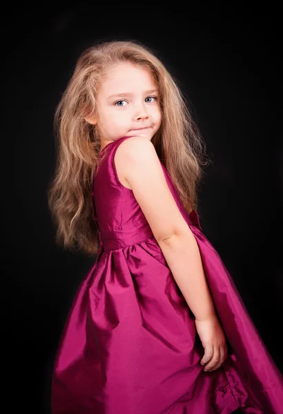 可爱的小女孩穿着粉红色的连衣裙 — 图库照片