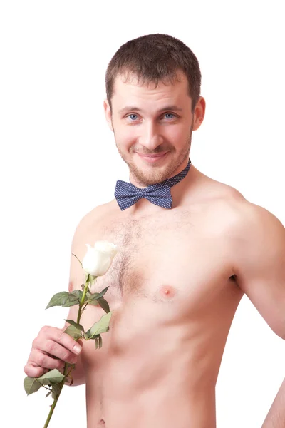 Hombre musculoso alegre posando con una rosa —  Fotos de Stock