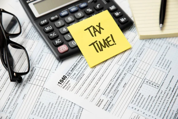 Tax time concept. US tax form, tax income, tax refund concept