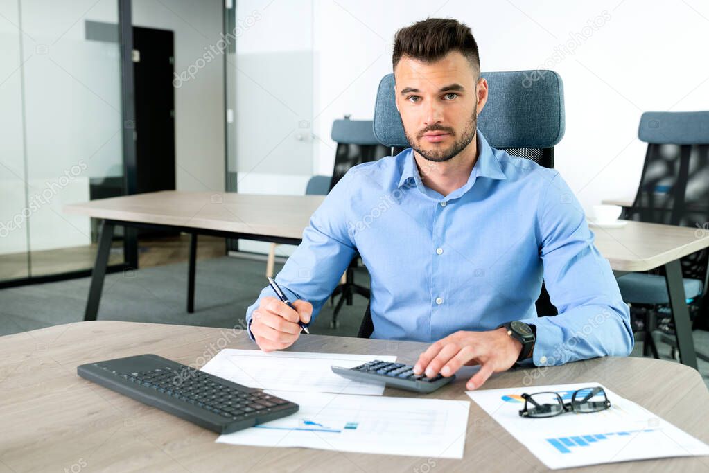 Businessman, accountant working in office. Bookkeeping concept