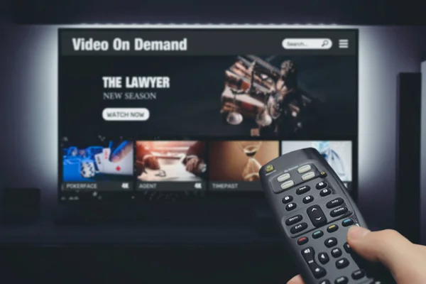 Video Demand Streaming Multimedia Hand Holding Remote Control — Stock Photo, Image