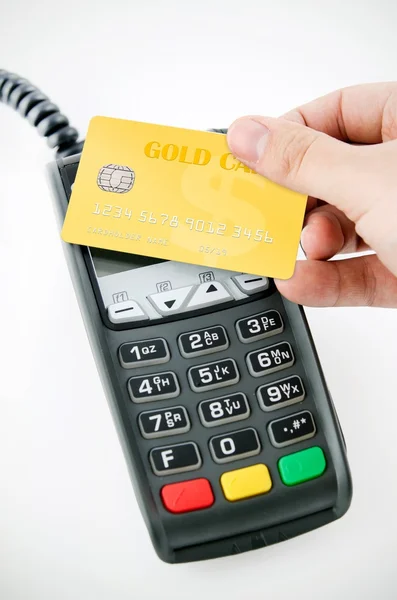 Contactless gold payment card with NFC chip using with terminal — Stock Photo, Image