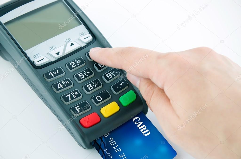 Man using payment terminal keypad, enter personal identyfication