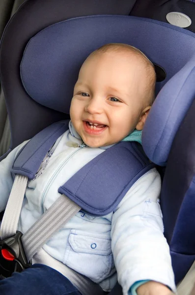Cute boy sitting in the car seat — Stock Photo, Image