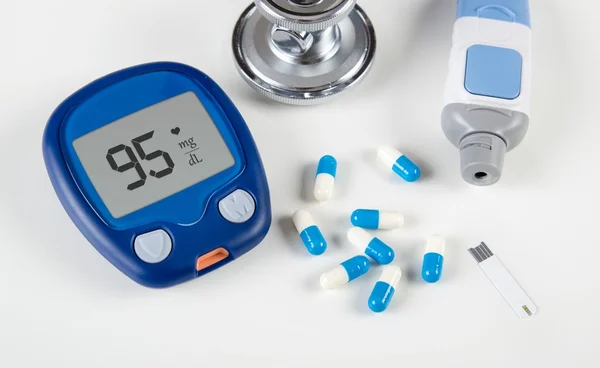 Diabetic test kit and stethoscope on white background — Stock Photo, Image