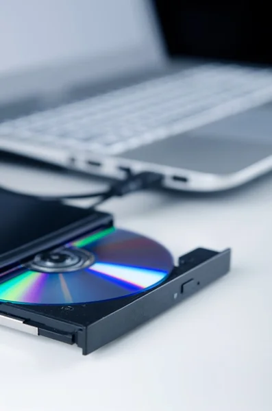 External optical disc writer. Compact device connected via USB p — Stock Photo, Image