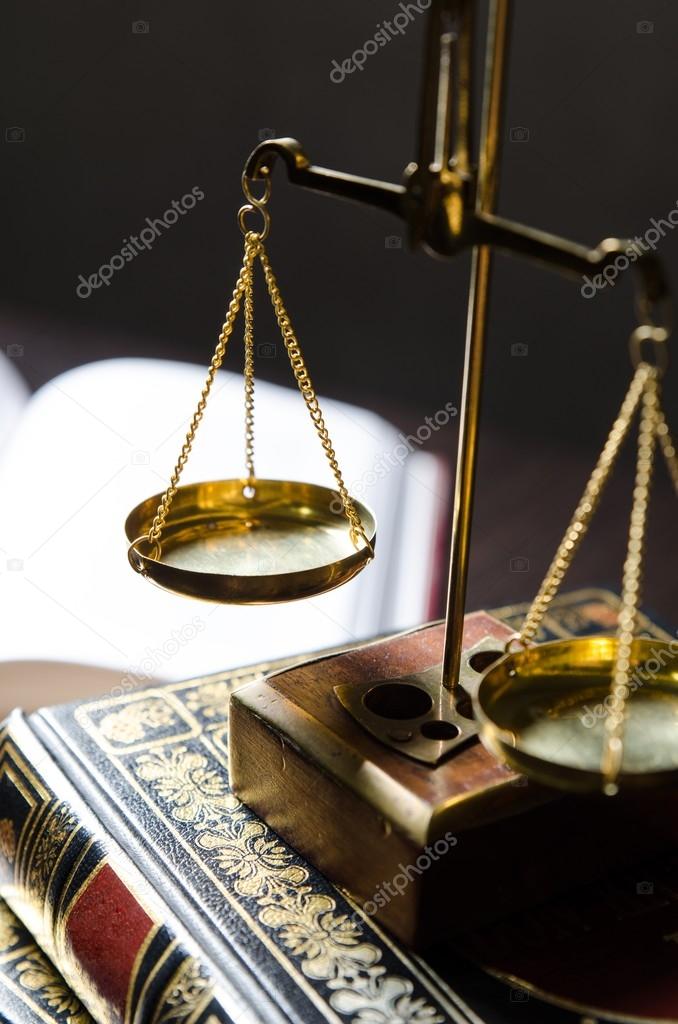 Weight scale and books. Scales of Justice composition