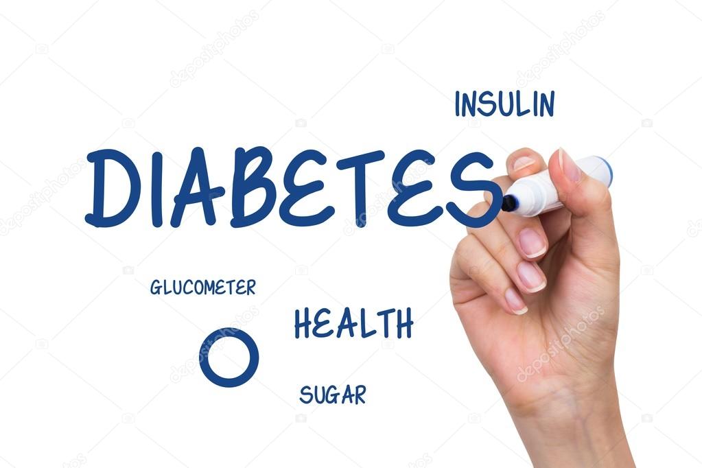 Hand writing diabetes content with blue marker