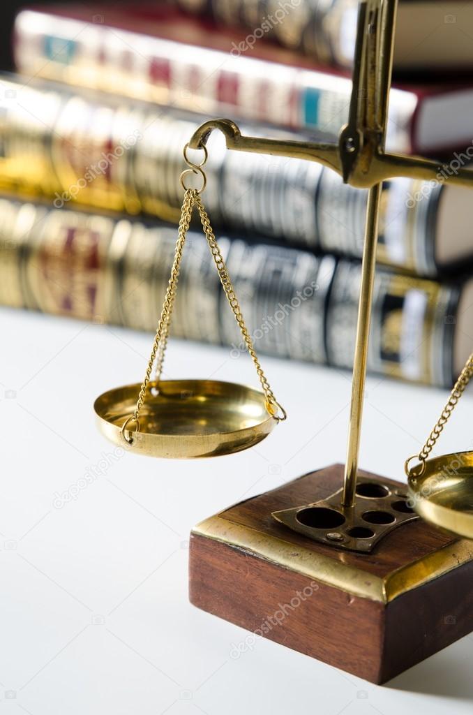 Weight scale and books. Scales of Justice composition