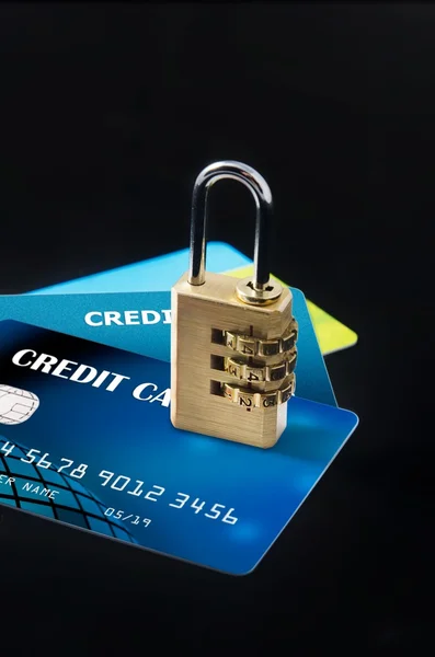 Security lock on multiple blank credit cards — Stock Photo, Image