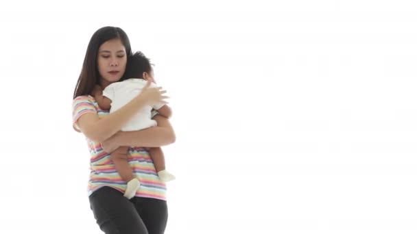 Asian Younger Lesbian Rainbow Shirt Embracing Sleeping Baby Boy Wlaking — Video