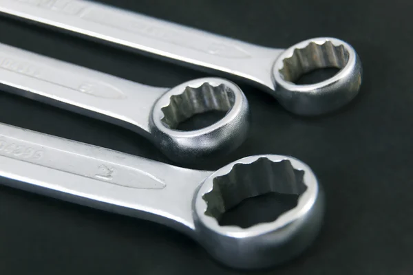 Tree steel wrenches in black background — Stock Photo, Image