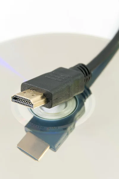 HDMI Plug and blu-ray — Stock Photo, Image