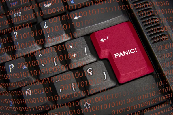 Паника в черной клавиатуре и красной клавише — стоковое фото