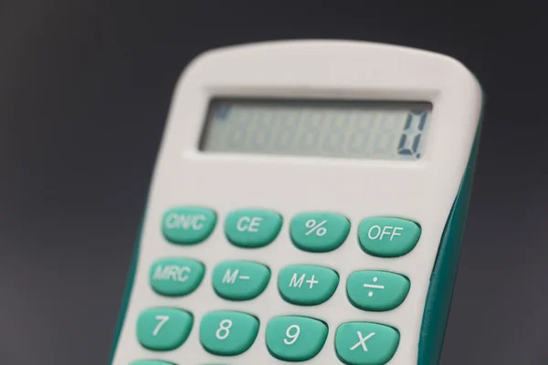 Electronic calculator in black background — Stock Photo, Image