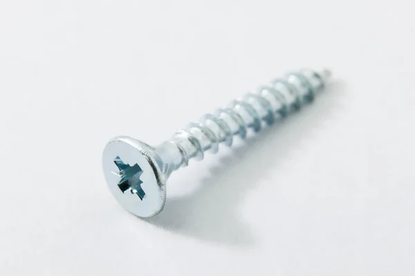 Screw in white background — Stock Photo, Image