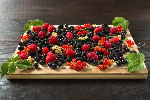 Berries on a board — Stock Photo, Image