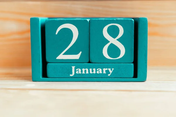 Enero Calendario Cubo Azul Con Mes Fecha Sobre Fondo Madera —  Fotos de Stock