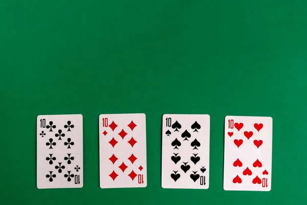 Poker Quads Playing Card Green Background Copy Space Text — Stock Photo, Image
