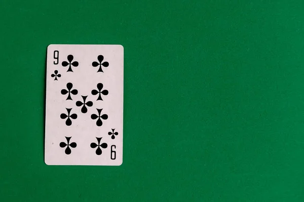 Nine Clubs Playing Card Green Background Top View Copy Space — Stock Photo, Image
