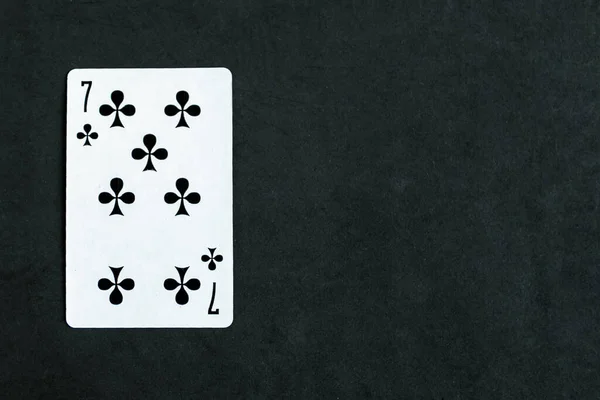 Seven Clubs Playing Card Black Background Top View Copy Space — Fotografia de Stock