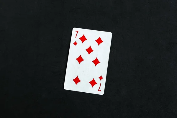 Seven Diamonds Playing Card Black Background Top View Copy Space — Stockfoto