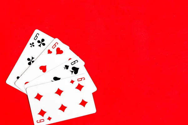 Poker Fyrhjulingar Spelkort Röd Bakgrund — Stockfoto