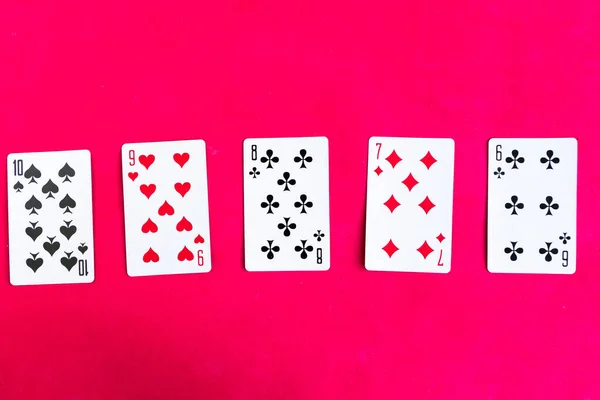 Poker Straight Flush Playing Card Top View Red Background — Stock Photo, Image