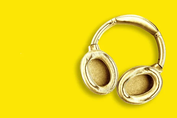 Big Modern Golden Headphones Isolated Bright Yellow Background Minimal Concept — 图库照片