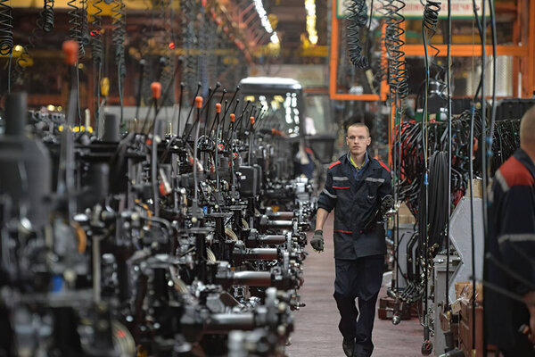 Medical equipment factory. Man control the pill production process