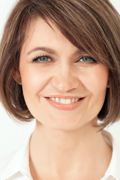 Headshot of adult woman with toothy smile. — Stock Photo, Image