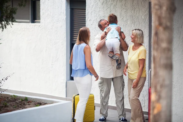 Grandfather greeting his young grandchild — Stock Photo, Image