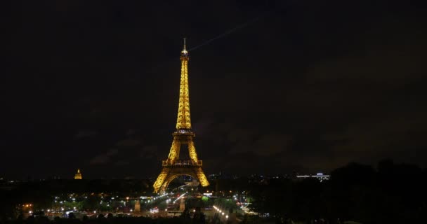 Timelapse of Eiffel Tower in golden light at night — Stock Video