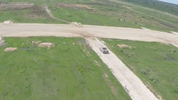 Flying over the shooting tank — Stock Video