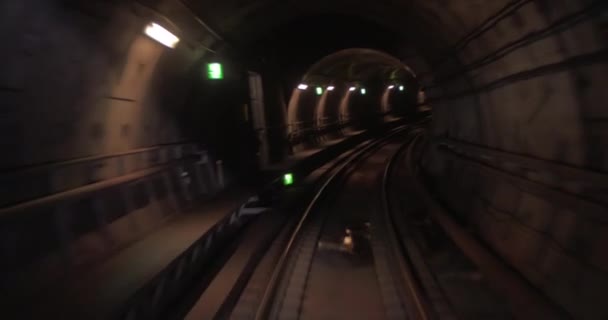 Train moving through the subway tunnel, cabin view — Stock Video