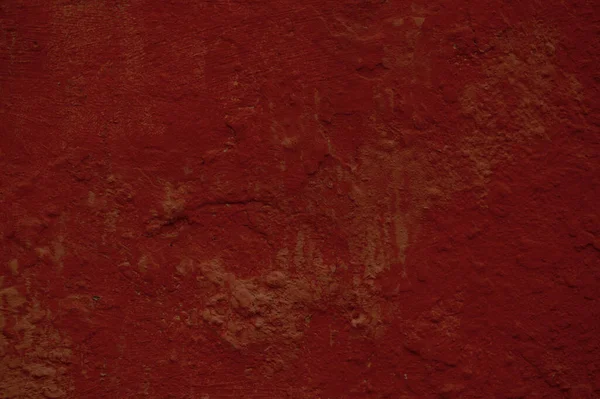 Темно-червоний фон текстури пофарбованої стіни — стокове фото