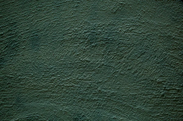 Plâtre rugueux peint texture de mur vert terne — Photo