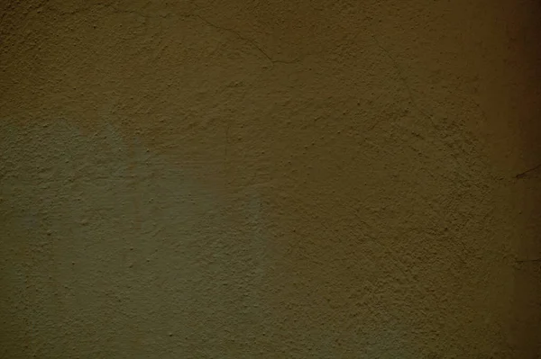 Grungy dull brown painted wall background texture