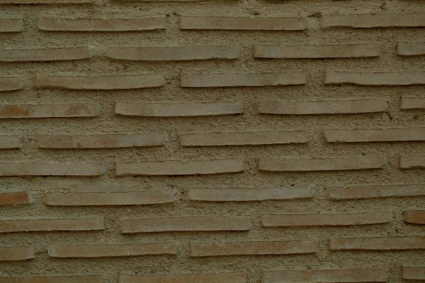Vecchio mattone parete sfondo texture con mattoni lunghi — Foto Stock