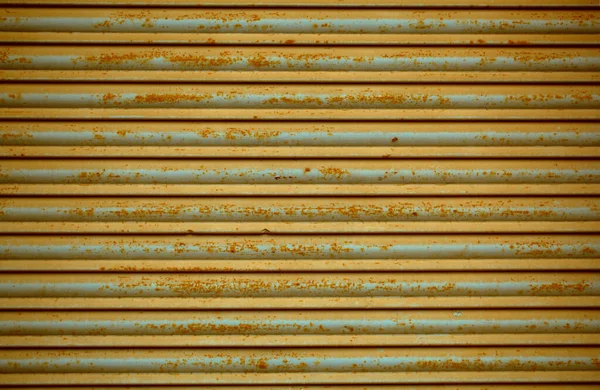 Old rusting metal security shutters texture — Stock Photo, Image