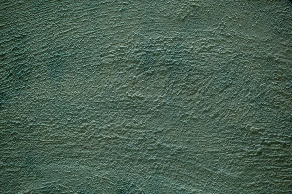 Gesso áspero pintado maçante textura parede verde — Fotografia de Stock