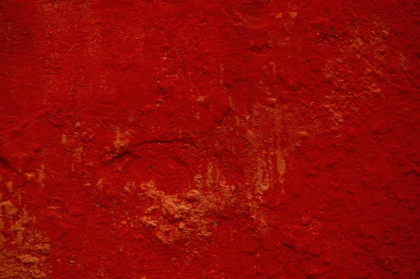 Textura de fundo vermelho escuro de uma parede pintada — Fotografia de Stock